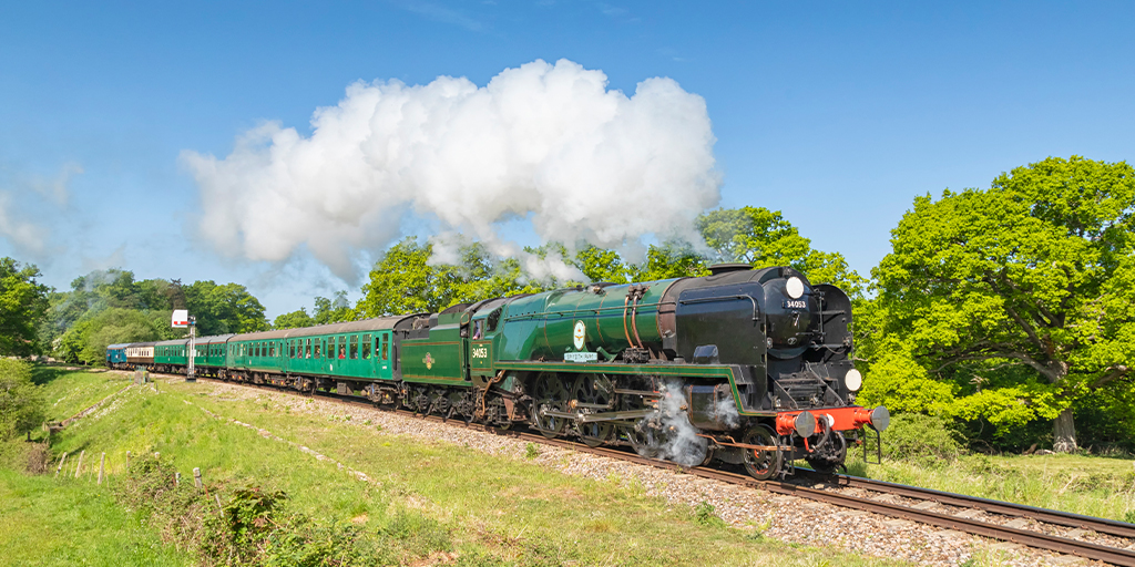 Green locomotive steam train