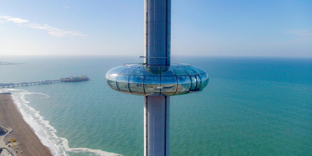 i360 tower against blue sea backdrop