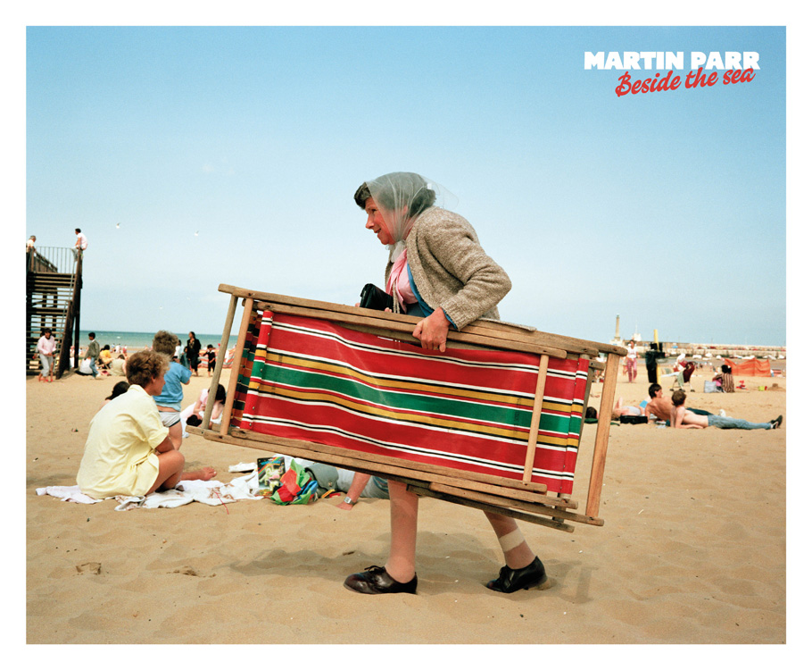 Person holding deck chair