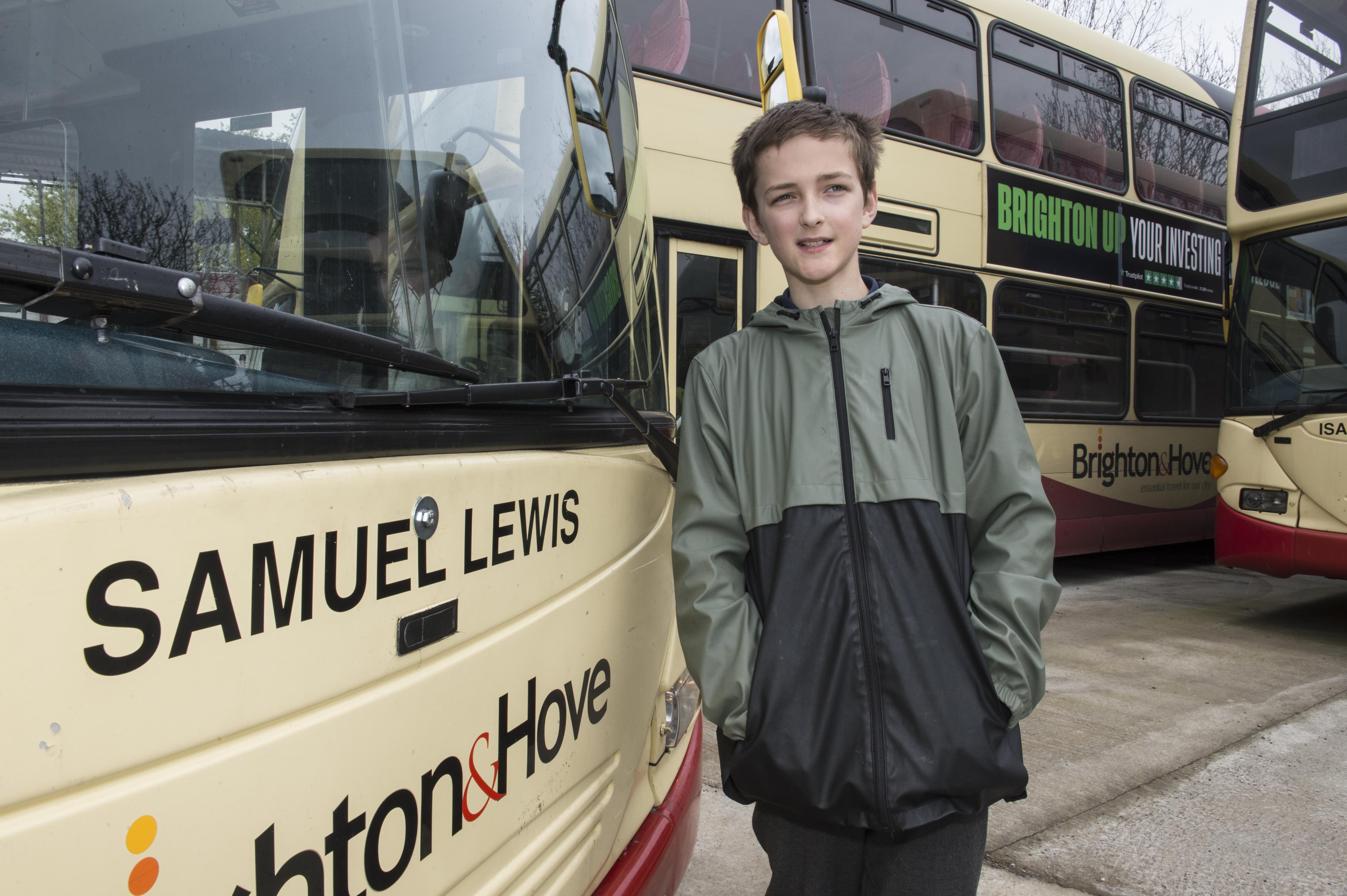 Peter Hood standing beside Samuel Lewis bus