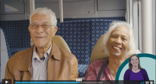 Photo of Bert and Shirley sitting together on the bus